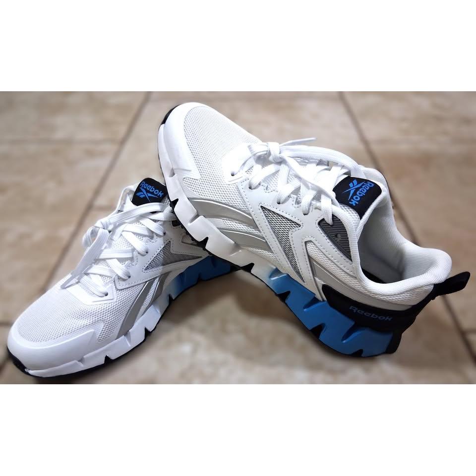 Reebok Zig Dynamica – Tenis Deportivo Hombre Blanco/Gris/Azul – Talla US 10