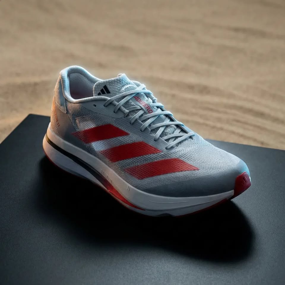 Adidas Adizero SL 2 – Vista lateral par gris/rojo LIGHTSTRIKE PRO grabado mediasuela